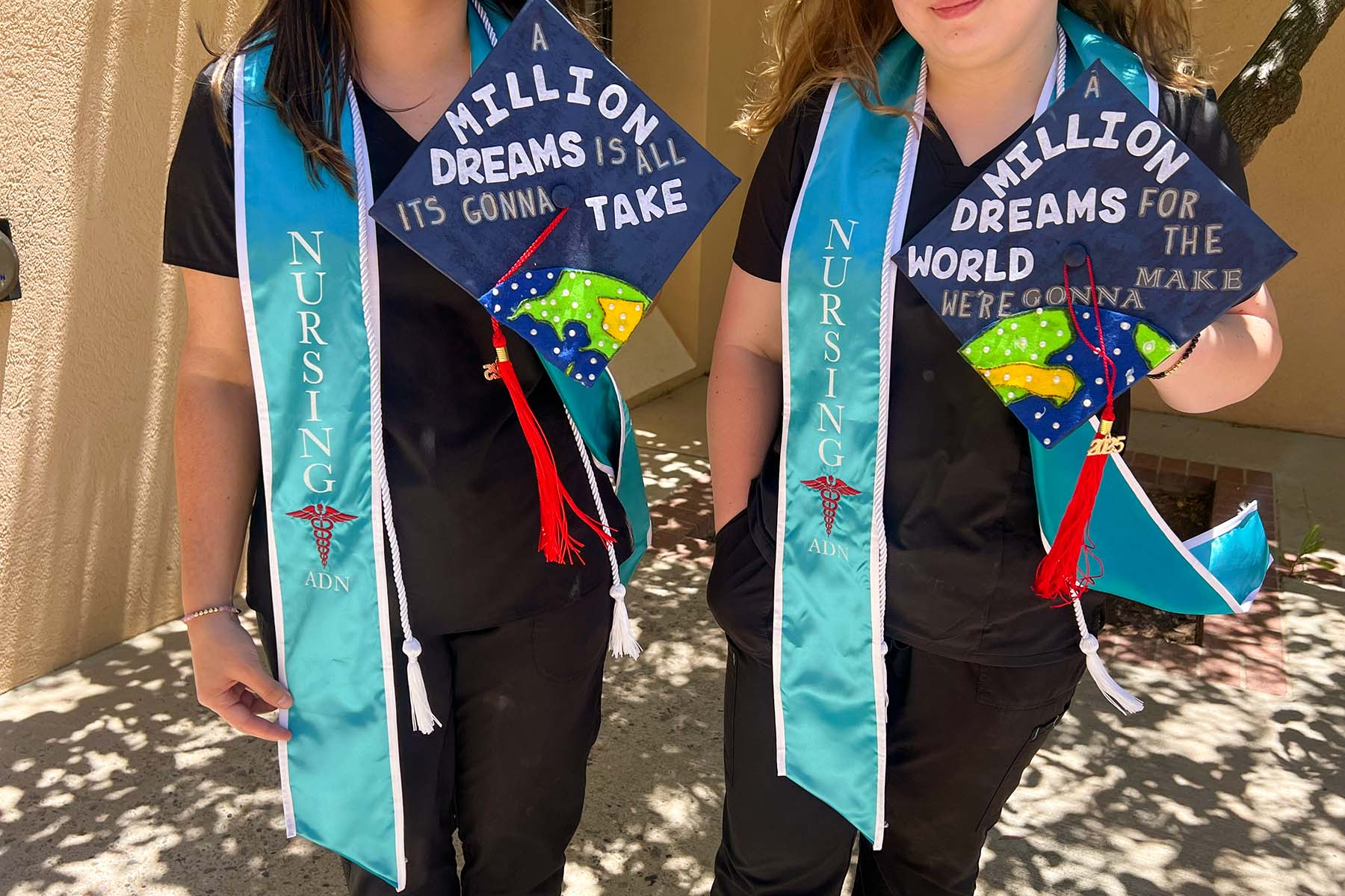Two nursing graduates