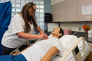 Nursing student in the simulation lab