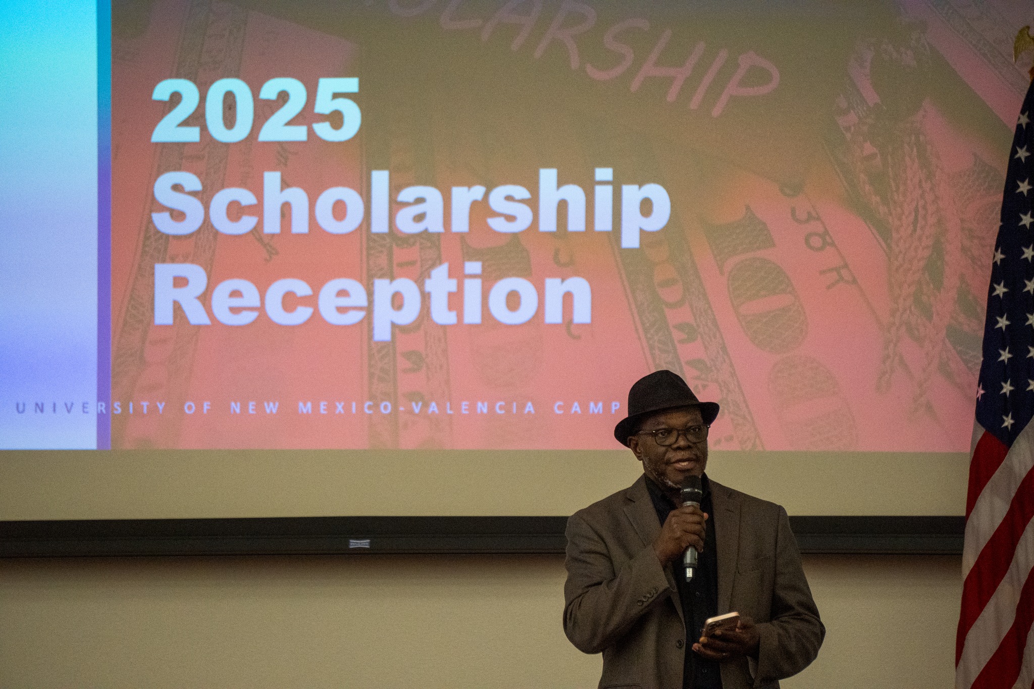 Dr. Dosumu delivers remarks at the scholarship reception.