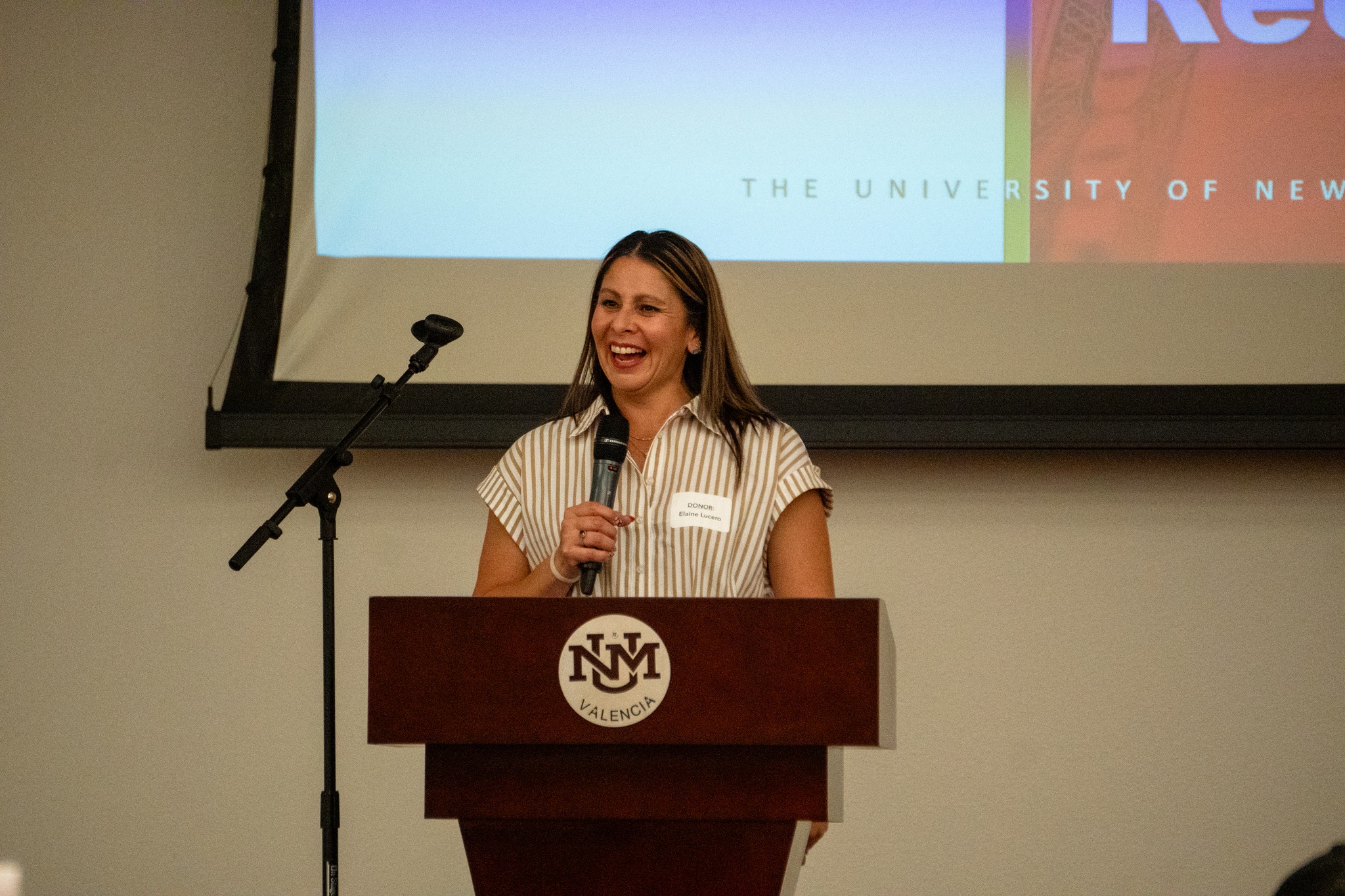 Donor, Elaine Lucero, speaks at the reception.