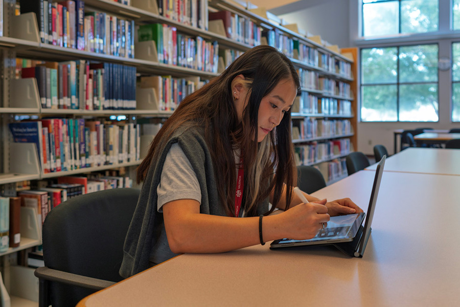 A student studies in the library